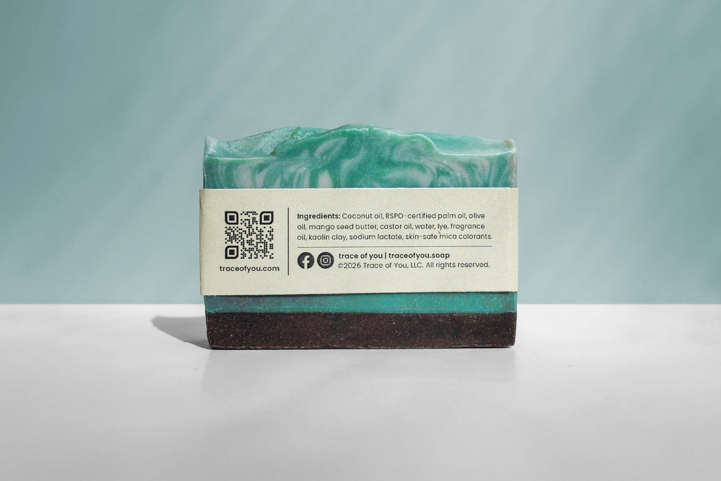 Bar of soap with a label on a light gray background