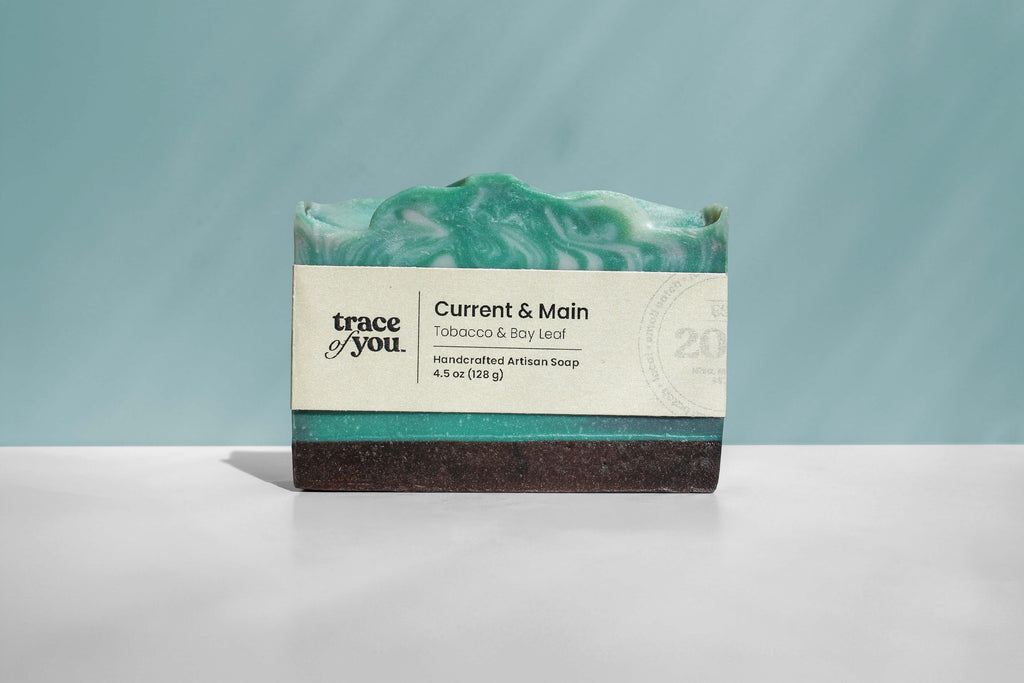 Bar of soap with a label on a light gray background