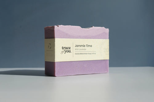 Bar of soap with a label on a gray background