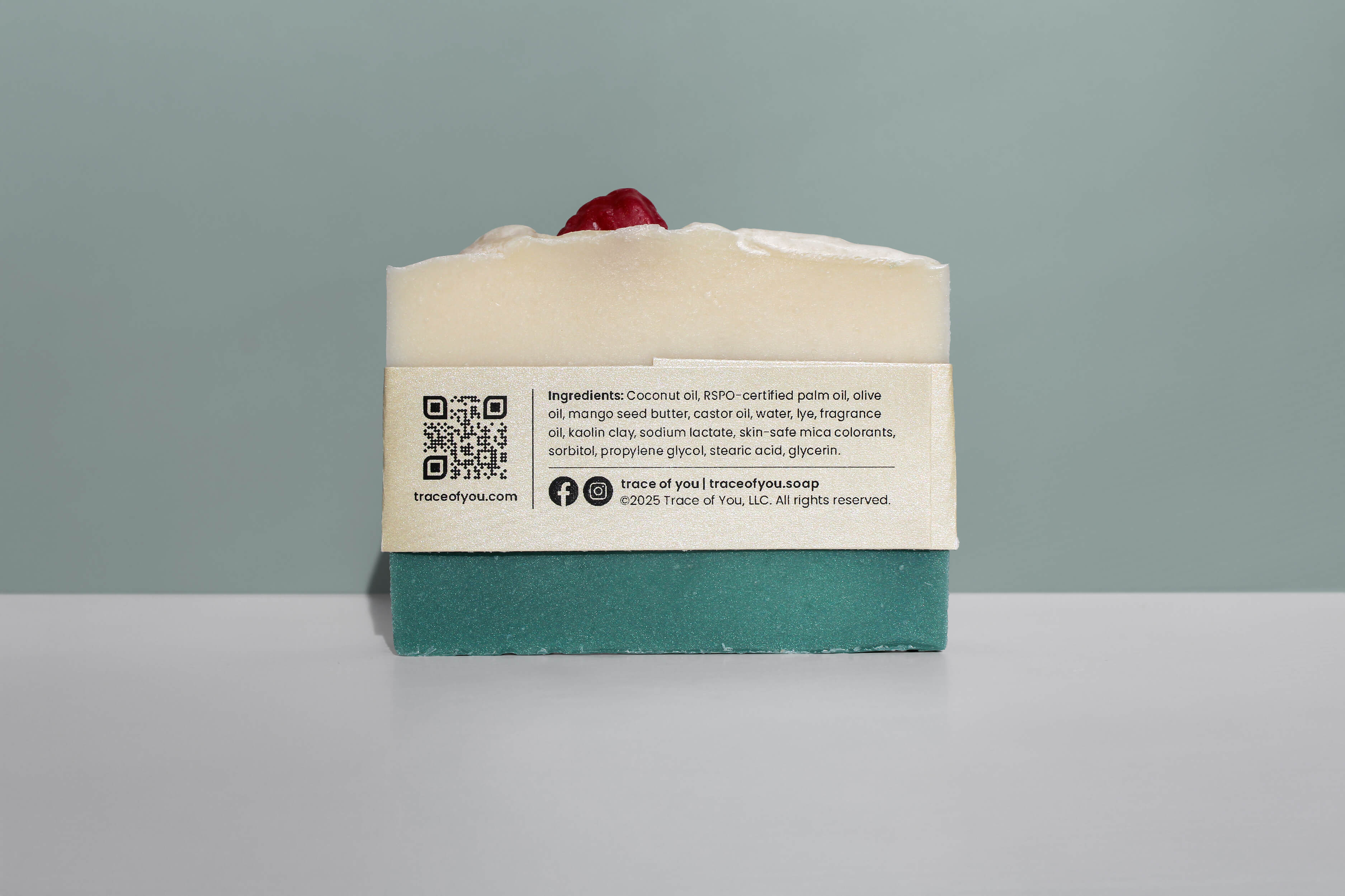 Bar of soap with a label on a gray background