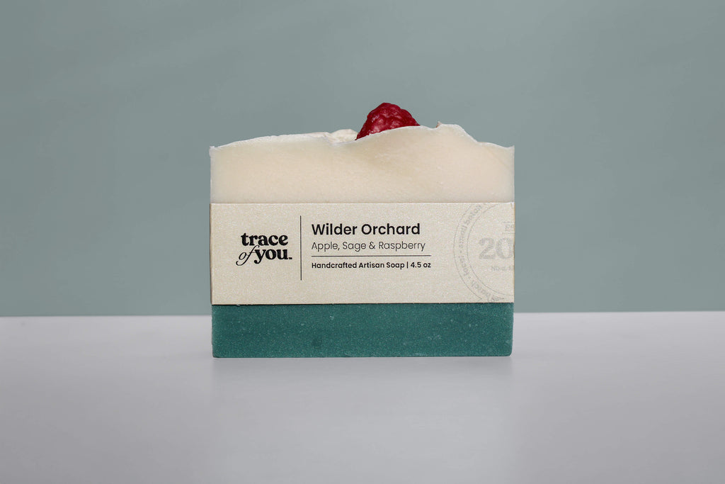 Bar of soap with 'trace of you' branding on a gray background